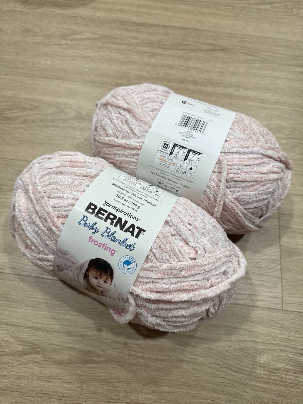 Bernat Baby Blanket Frosting yarn in the Cozy Rosie 2 skeins